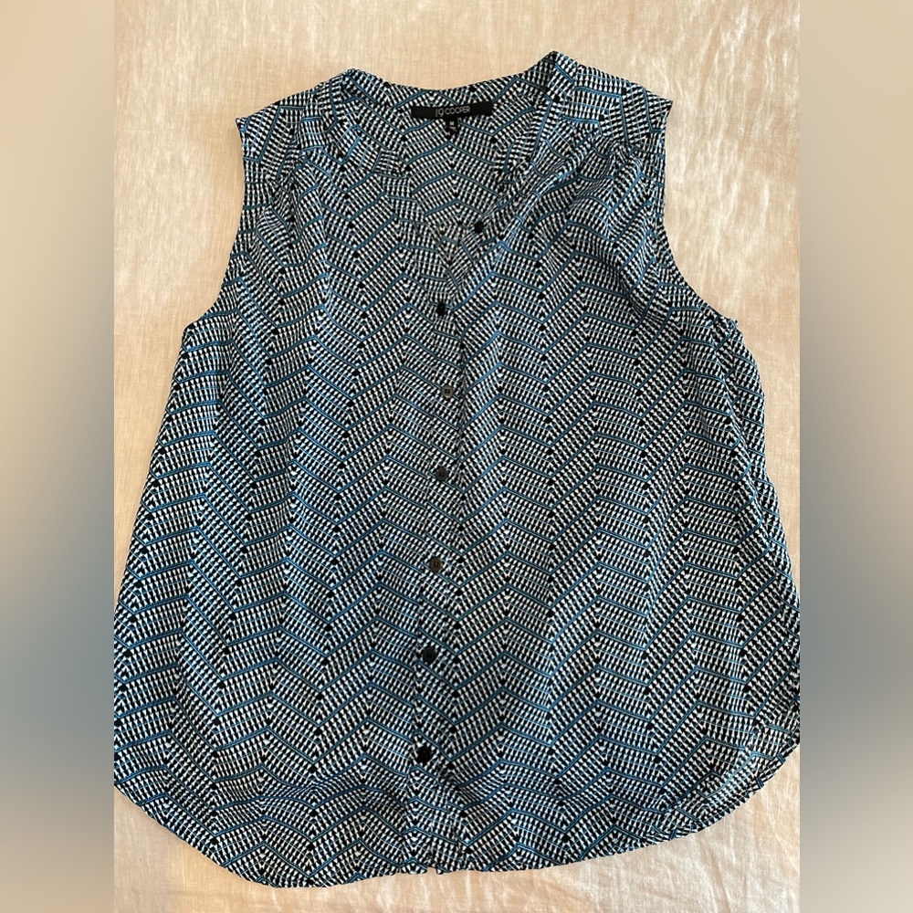 Medium blue, black and white blouse